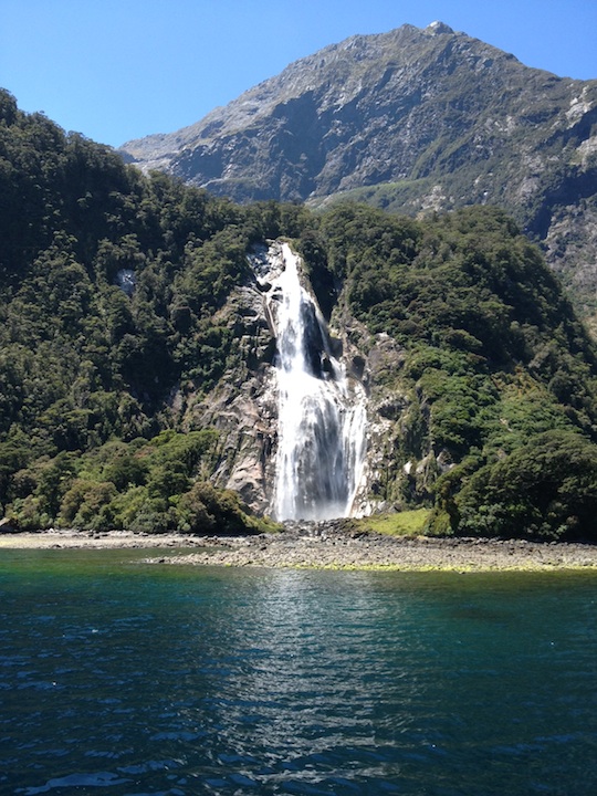 Waterfall in Milford Sound New Zealand